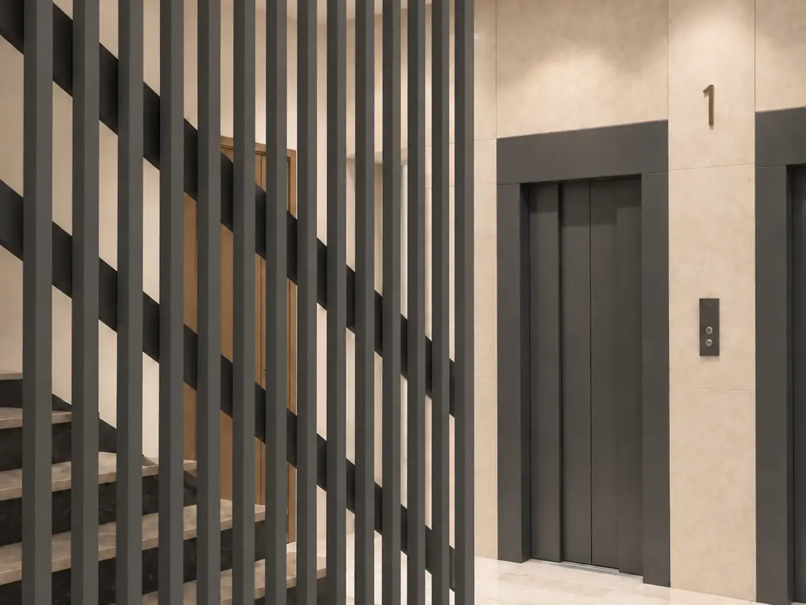 Portal de comunidad rehabilitado con celosía vertical gris y acceso al ascensor